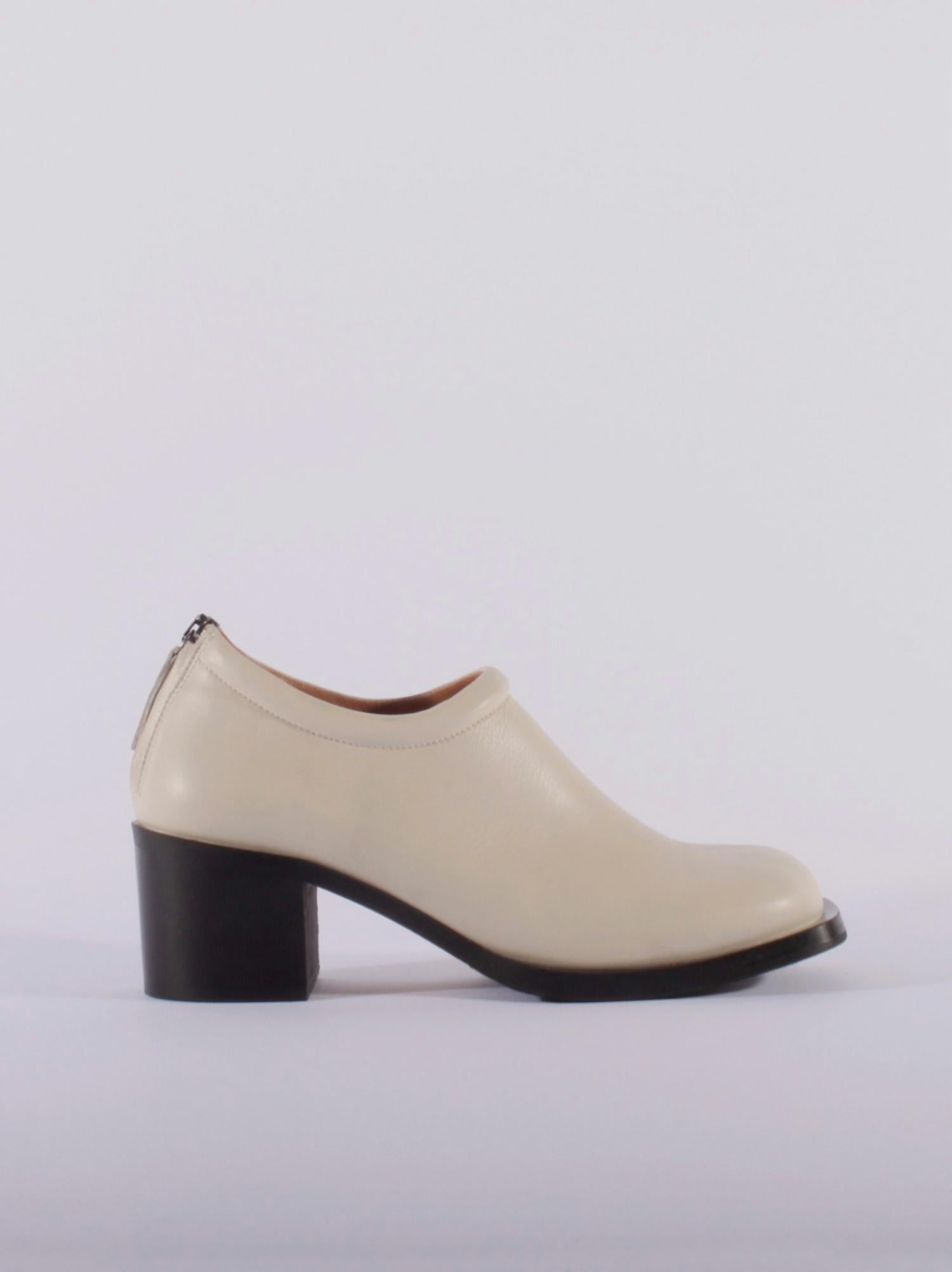 6d3ce2fb-a05b-4dfd-944f-d1714ae010c1-upscale_15k-1500x1500-1 About Arianne - Women's Ava Heeled Leather Pumps - Image 1